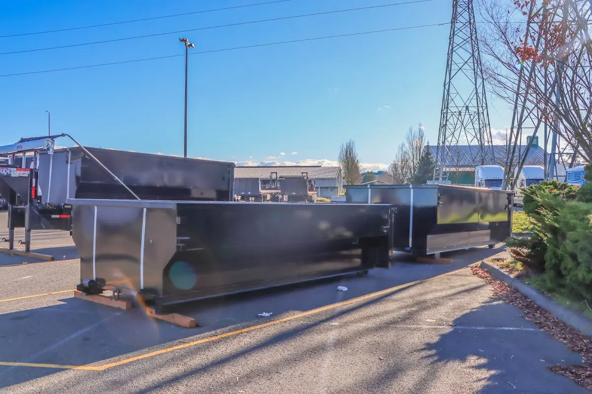 Roll-off dumpster ready for waste disposal at job site for Concrete Dumpster Rental in Bowling Green